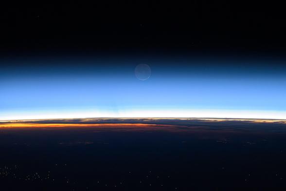 Moonrise_over_the_Philippine_Sea_(53904335864).jpg