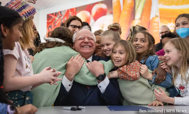 March 7, 2023 Surrounded by school children, teachers, advocates and public officials, Gov. Tim Walz signed a bill into law Friday to provide breakfasts and lunches at no charge to students at participating schools. It makes Minnesota the fourth state in the country to do so.  
Photo by Ben Hovland | MPR Newshttps://img.apmcdn.org/65784a1f8699fe9fb50dda8337e0446e310037e7/normal/2fccad-20230317-schoolmeals-08-webp1400.webp 
https://www.mprnews.org/story/2023/03/17/gov-signs-universal-school-meals-bill-into-law