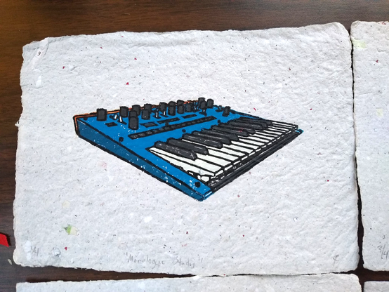 A very small print of a korg monologue synthesizer. It is angled toward the viewer so that the leftmost key is closest, and the whole synth is rendered in perspective. The case is blue, with white keys, dark gray black keys and knobs, and a wood panel across the back of the synth that is only just visible in the print. The lines of the drawing are black, giving a bit of a cel-shaded look to the image. 

The short key bed only has 25 smallish keys, and there are 16 knobs and 11 switches on the panel above the key bed, along with several buttons. These were very time-consuming to carve so small :P

There are little bits of white here and there where the ink was not able to fully reach into the crevices of the paper, but the overall impression is solid.

The image is printed on home-made paper that is light-gray and fairly coarse in texture. It is ~4x6in (~10x16cm), and the print itself is roughly 2x4in (~5x10cm). I made the paper from a bunch of junk mail and am very pleased with myself for starting to use my own paper in my prints.

And I've only just realized as I write this that I forgot to flip the image that I used to lay out my linoleum, so it's a mirror of the actual layout of the real synth. Don't tell anyone, it'll be our little secret!