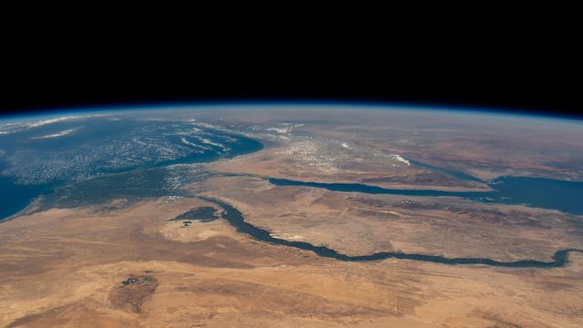 The_Nile_River_flows_into_the_Mediterranean_Sea_(iss071e405499).jpg