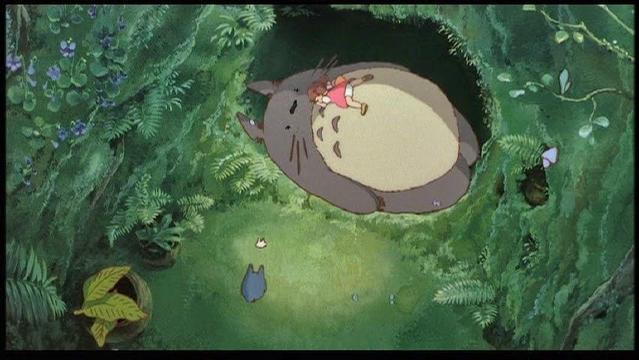 Totoro and Mei sleep for a while in the Totoro Tree. From the anime 