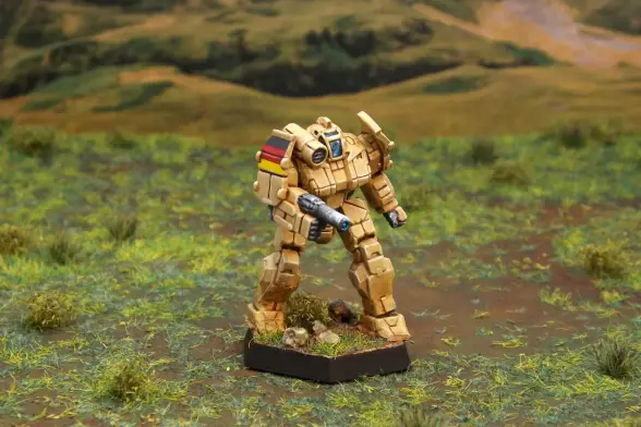 A painted miniature of a Griffin 'Mech.  It is tan and the cockpit glass is blue.  The right pauldron has three horizontal stripes: black, red, and gold.  The miniature is photographed on grassy terrain.