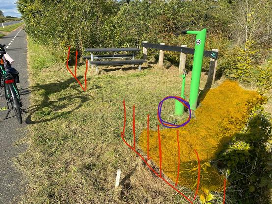 Photo of the bikestop. Some red lines where the hedge was, in yellow the wildflower area