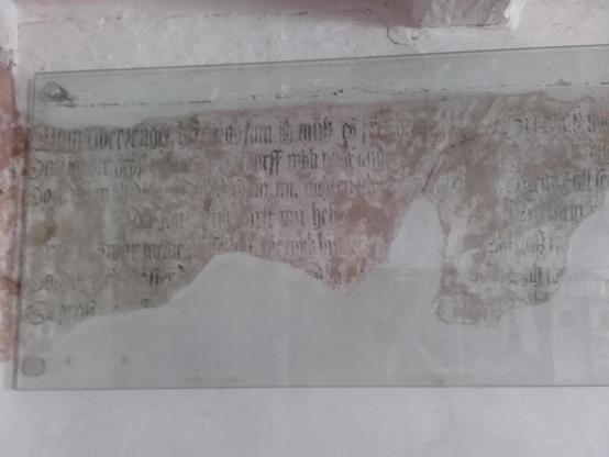 Rests of an old fresco in one of our museum rooms. It shows a text of a religious song. With the help of that text, we could reconstruct the history of that room: It was used for religious gatherings in the 17th c.