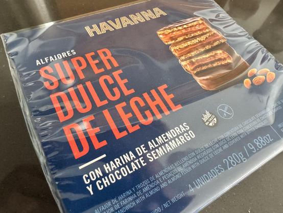 A box of Argentine “alfajores” of the Havanna brand featuring the inscription “Super Dulce de Leche” on it