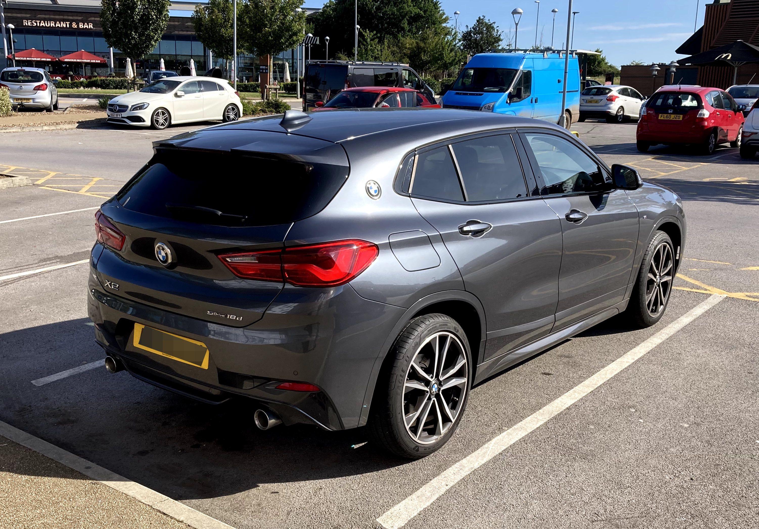 Grey metallic BMW X2 - rear quarter view