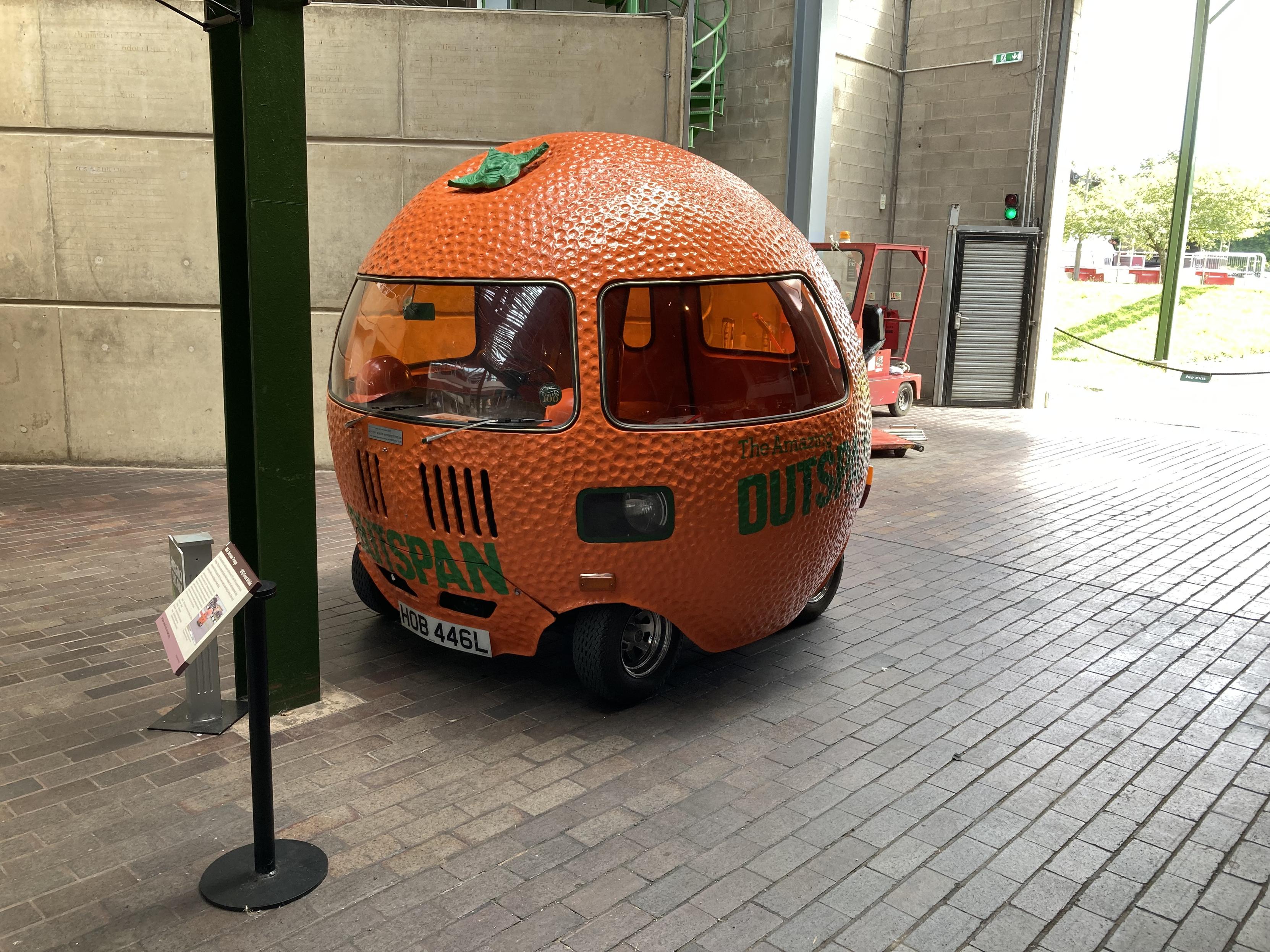 Near-spherical Mini Outspan Orange, with orange tinted windows