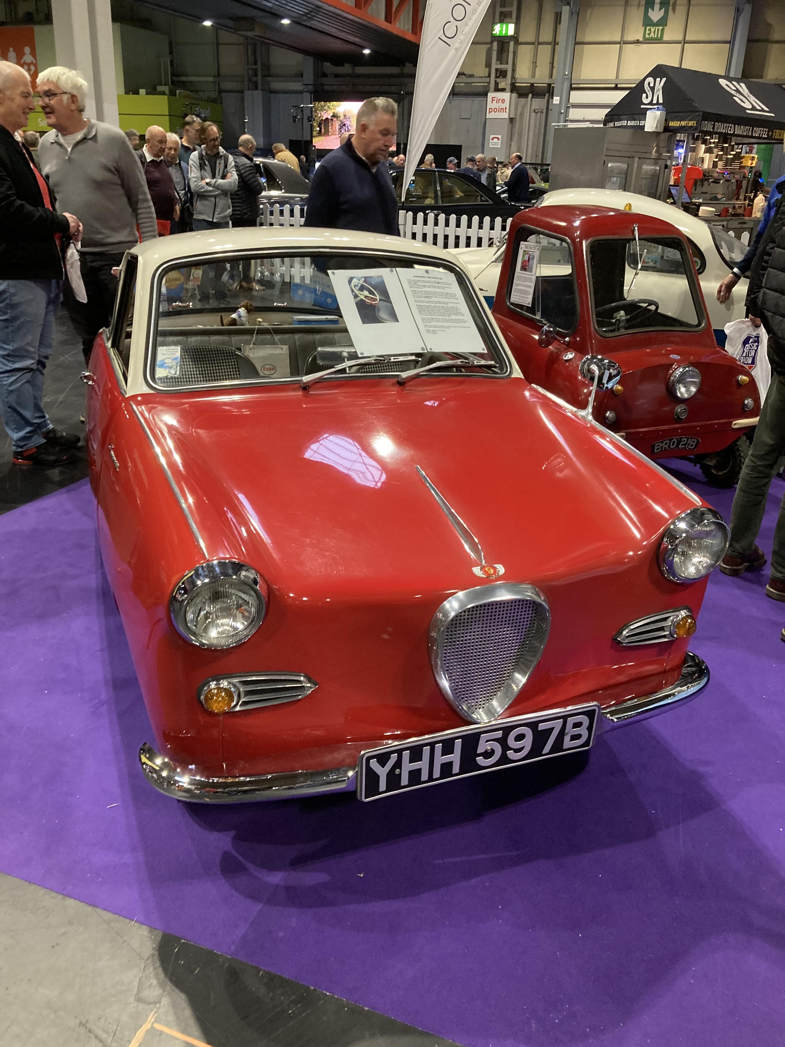 Red Goggomobil TS coupé with cream-coloured roof, frontal view