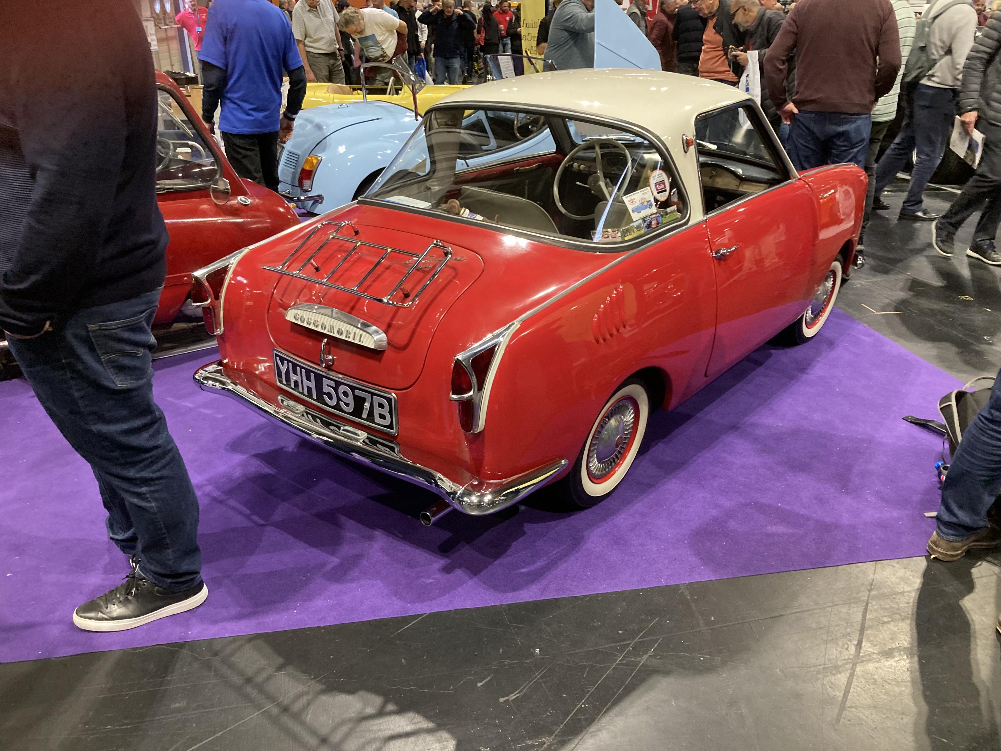 Red Goggomobil TS coupé with cream-coloured roof, rear quarter view