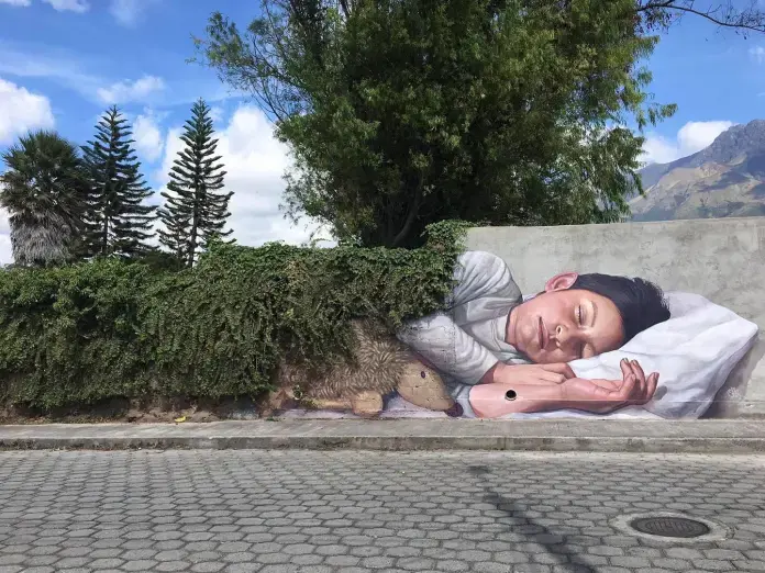 A boy sleeps against a wall, half-covered by ivy that becomes his blanket. His teddy bear lies beside him as if the plants are tucking him in. A boy sleeps against a wall, half-covered by ivy that becomes his blanket. His teddy bear lies beside him as if the plants are tucking him in.