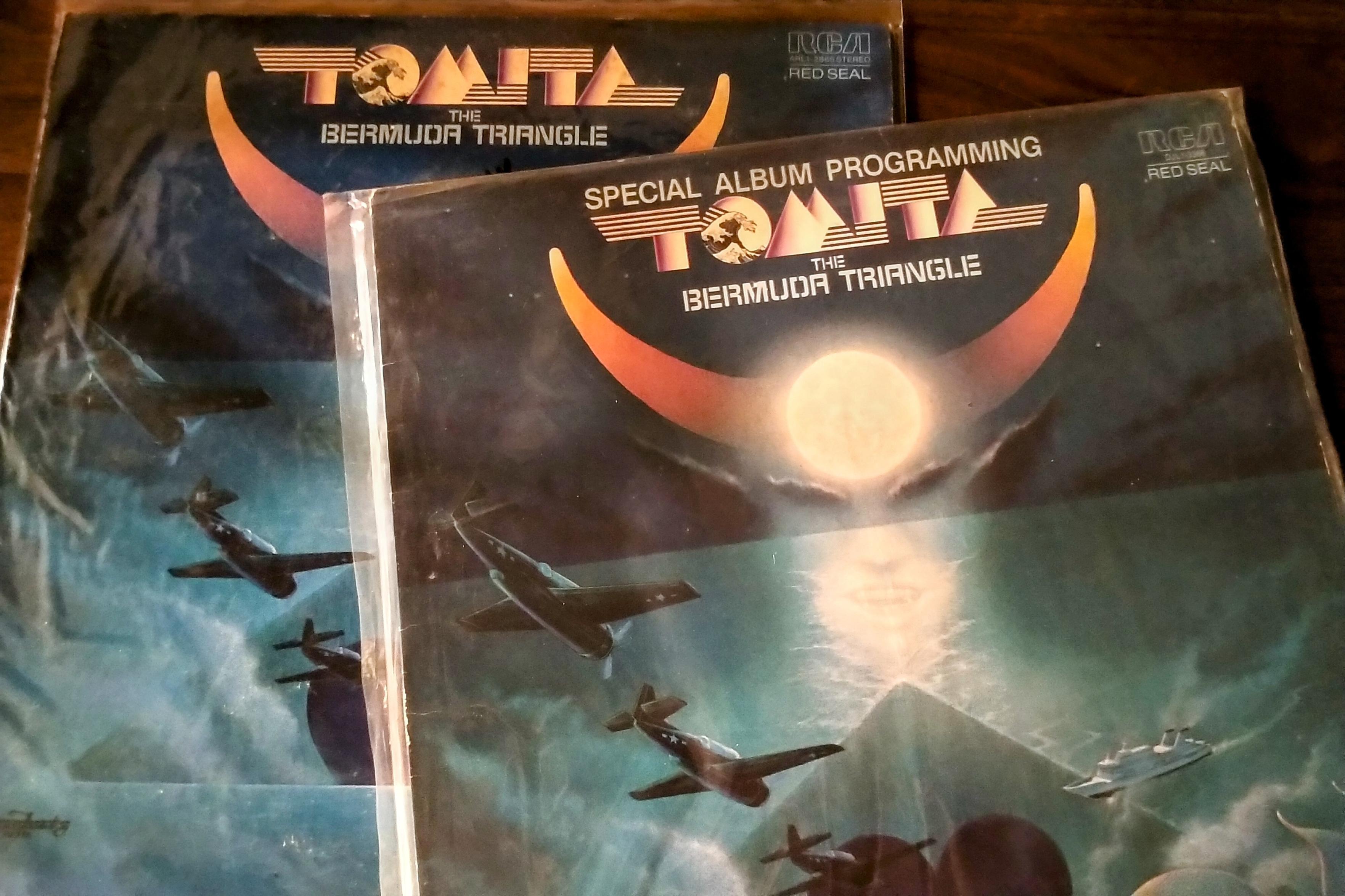 Tomita Bermuda triangle record jackets. Promo is regular sleeve with "special album programming" above the title while the full album is a gatefold jacket