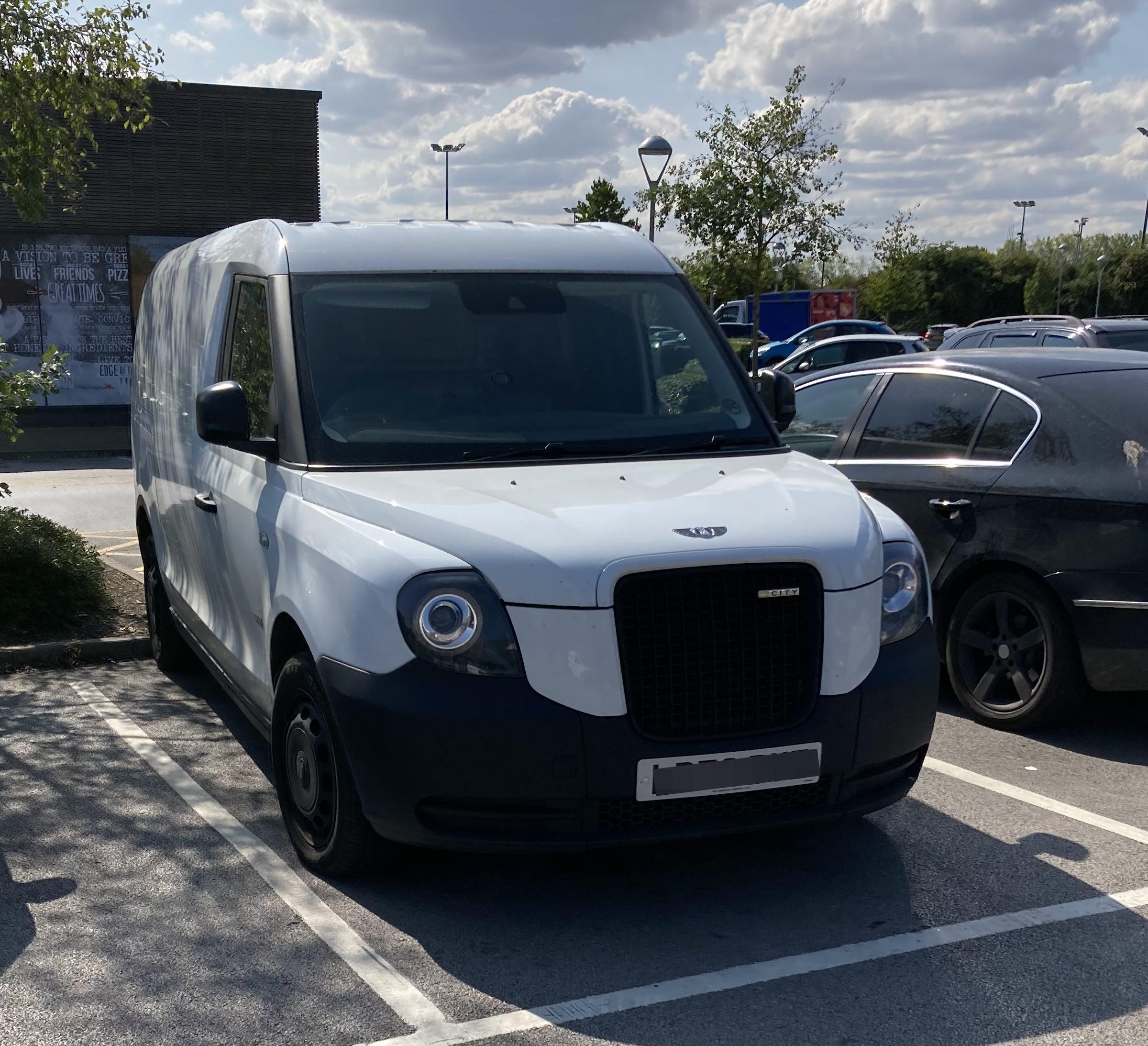 White LEVC VN5 range-extender van, frontal view