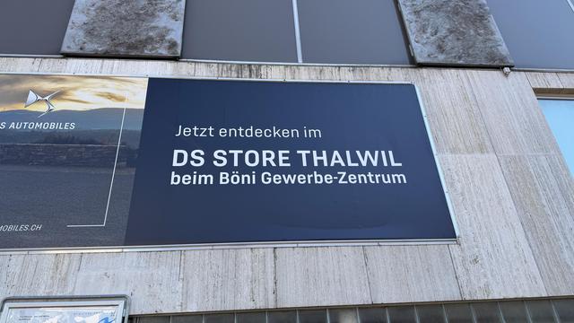 Street advertising for a thing called "DS Store" in the Swiss town of Thalwil