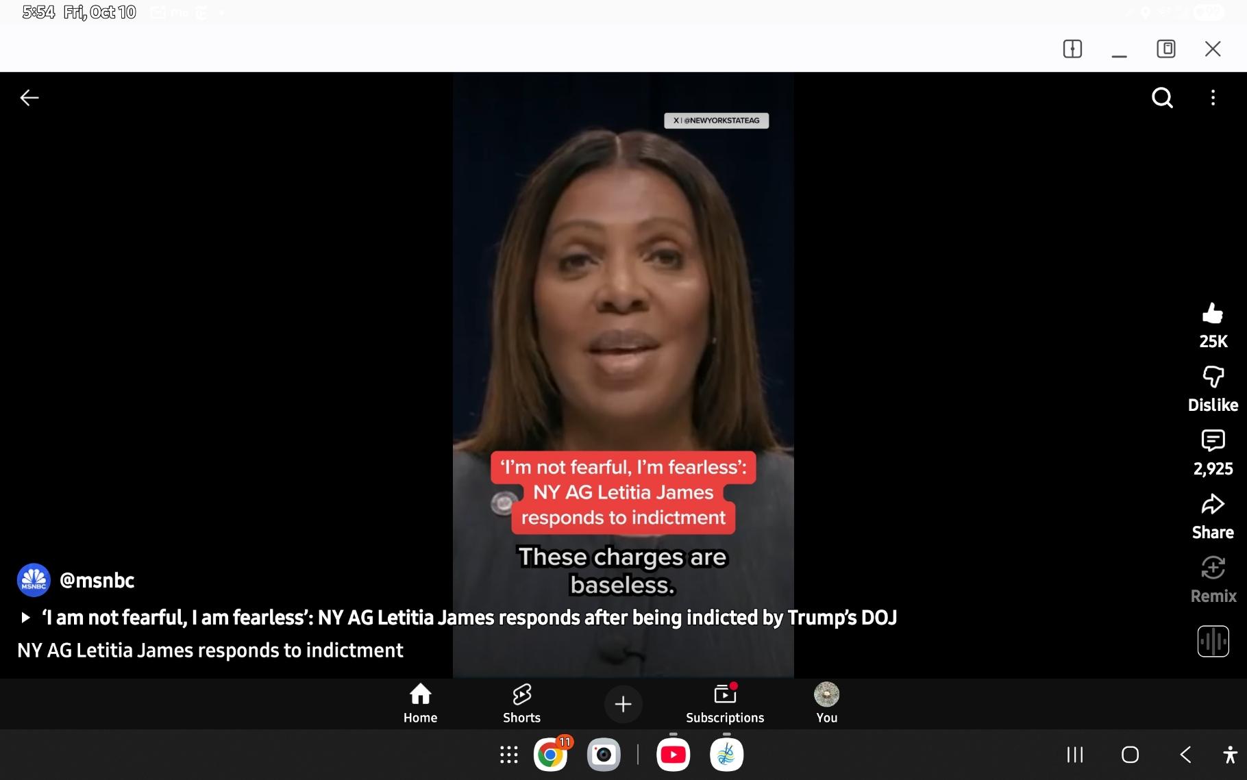 New York Attorney General Letitia James, a black woman facing front to the camera in a gray suit, delivering a video response to her indictment