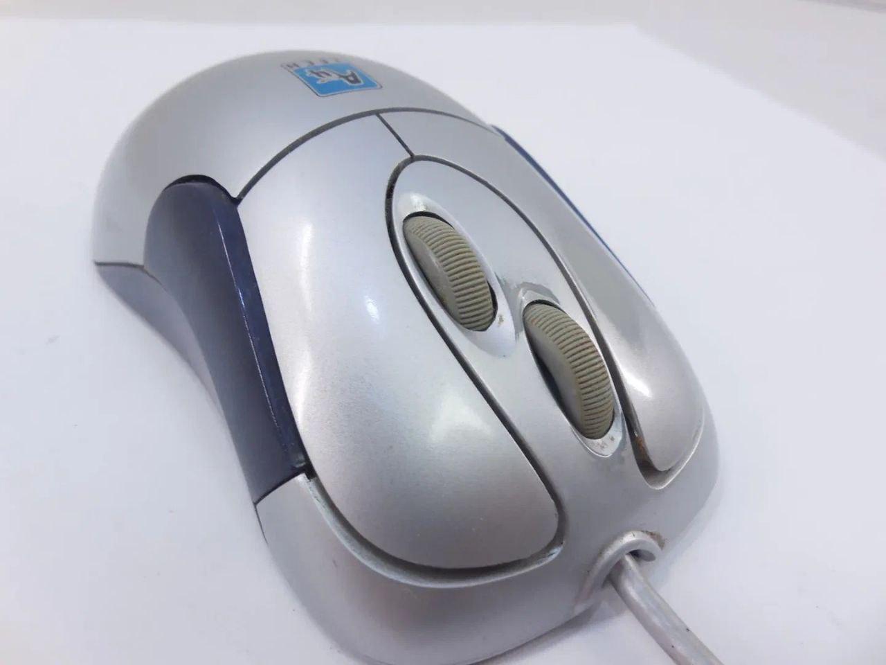 Photo of a computer mouse with two wheels