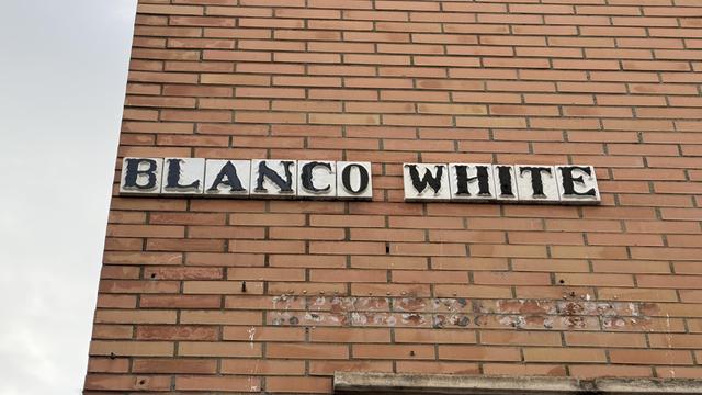Photo of a street sign in Sevilla, Spain, showing the name of the street "Blanco White"