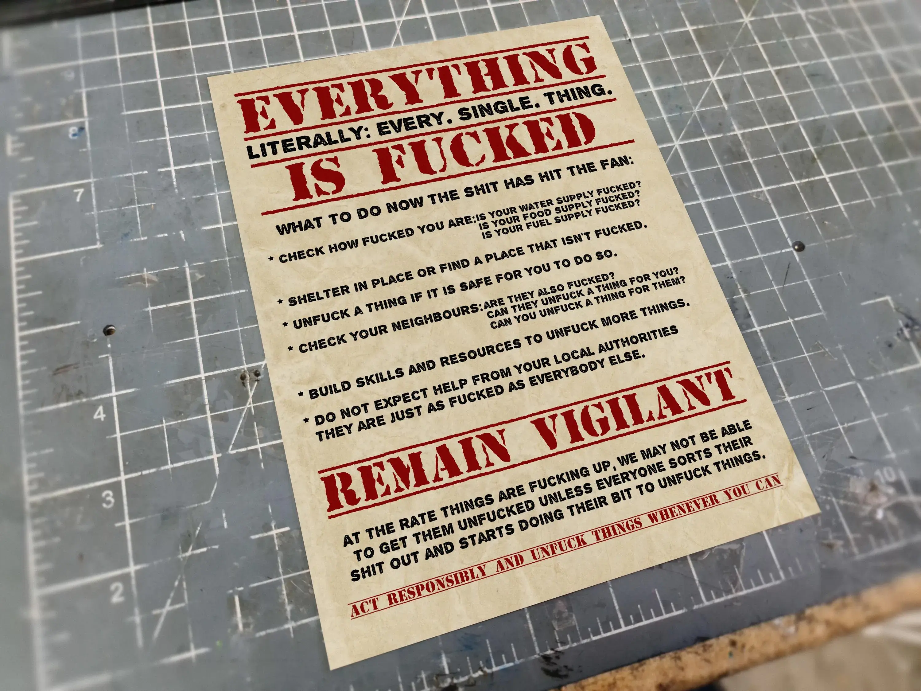 A metal sign telling us all the truth: Everything is Fucked, and how we can fix it.