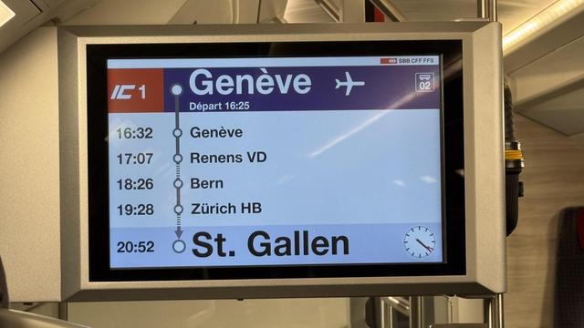 Photo of an information screen on a Swiss train leaving Geneva Airport towards Zurich.