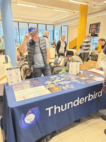 FOSDEM attendees checking out the Thunderbird stand