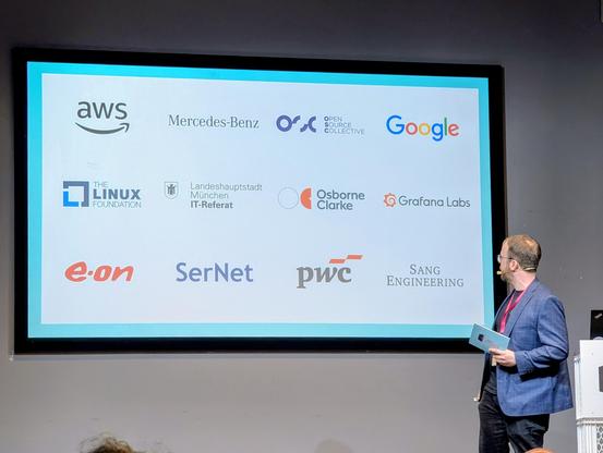 Photo from the intro at FOSS Backstage thanking the sponsors, including aws, Google, eon, pwc