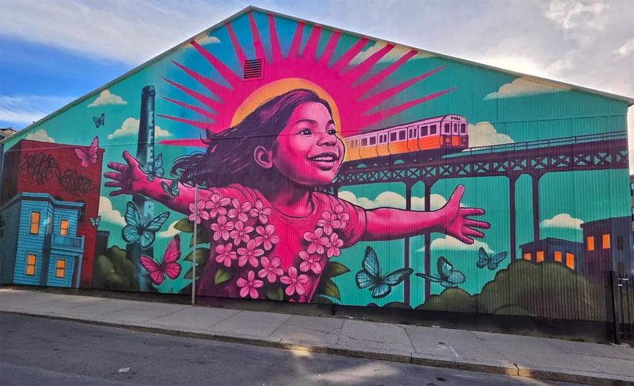 Handmaid says getting kicked off the Orange Line at Stony Brook at least meant she got to see this cool mural at the Brewery, showing a happy girl in front of the old el