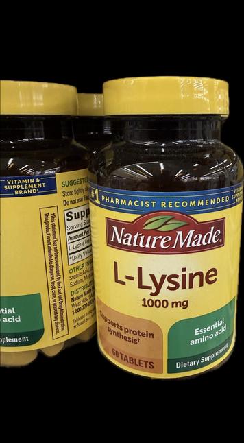 Nature Made L-Lysine vitamin bottles. 