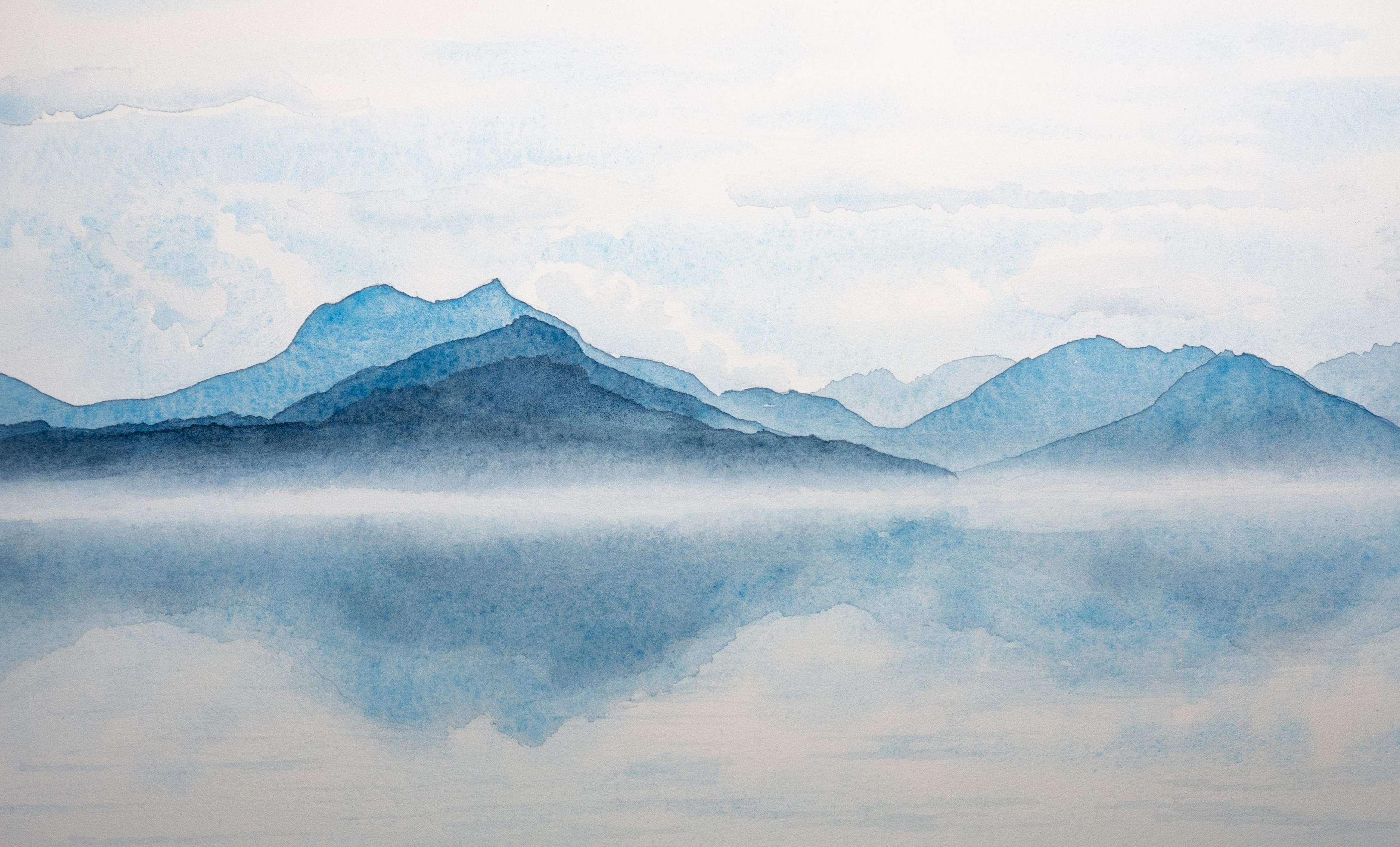 Watercolour in blues. Low mist obscures the meeting of mountains and sea across the centre of the picture.  The sea is almost calm and reflects the mountains and sky.