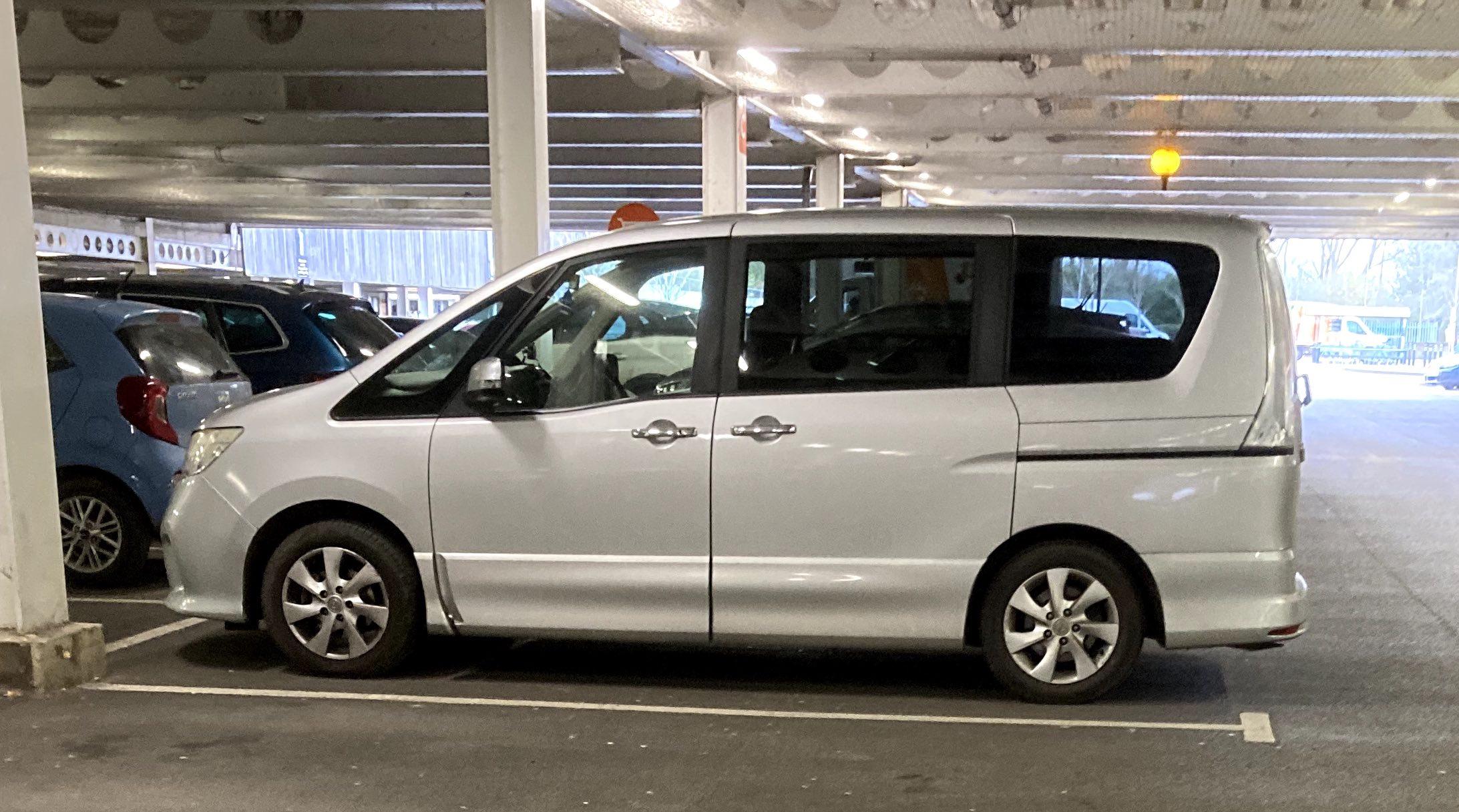 Silver Nissan Serena, side view