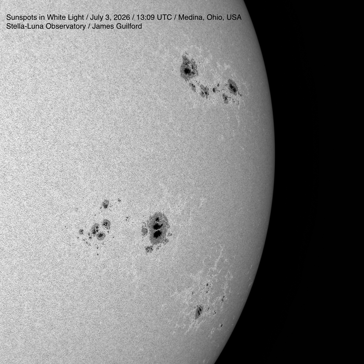 This is a white light image made using a Baader Planetarium Herschel wedge for safe and enhanced viewing. The three active regions bearing sunspots are shown here, top to bottom: AR 4479, 4478, and 4480. They are approaching the western solar horizon and will soon disappear from view. The granular structure of the photosphere is also on display here. July 3, 2026.