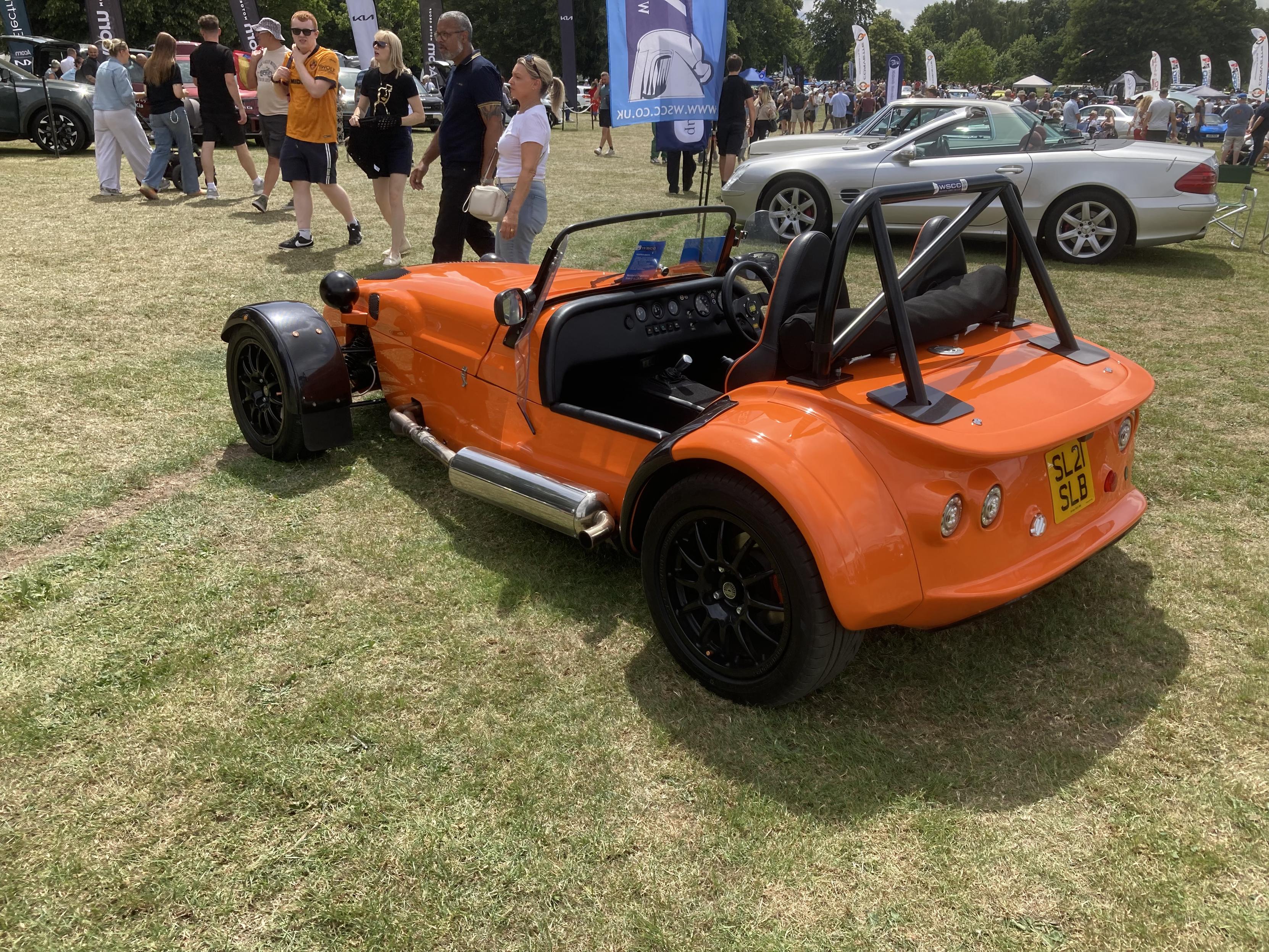 Orange Westfield roadster, rear quarter view