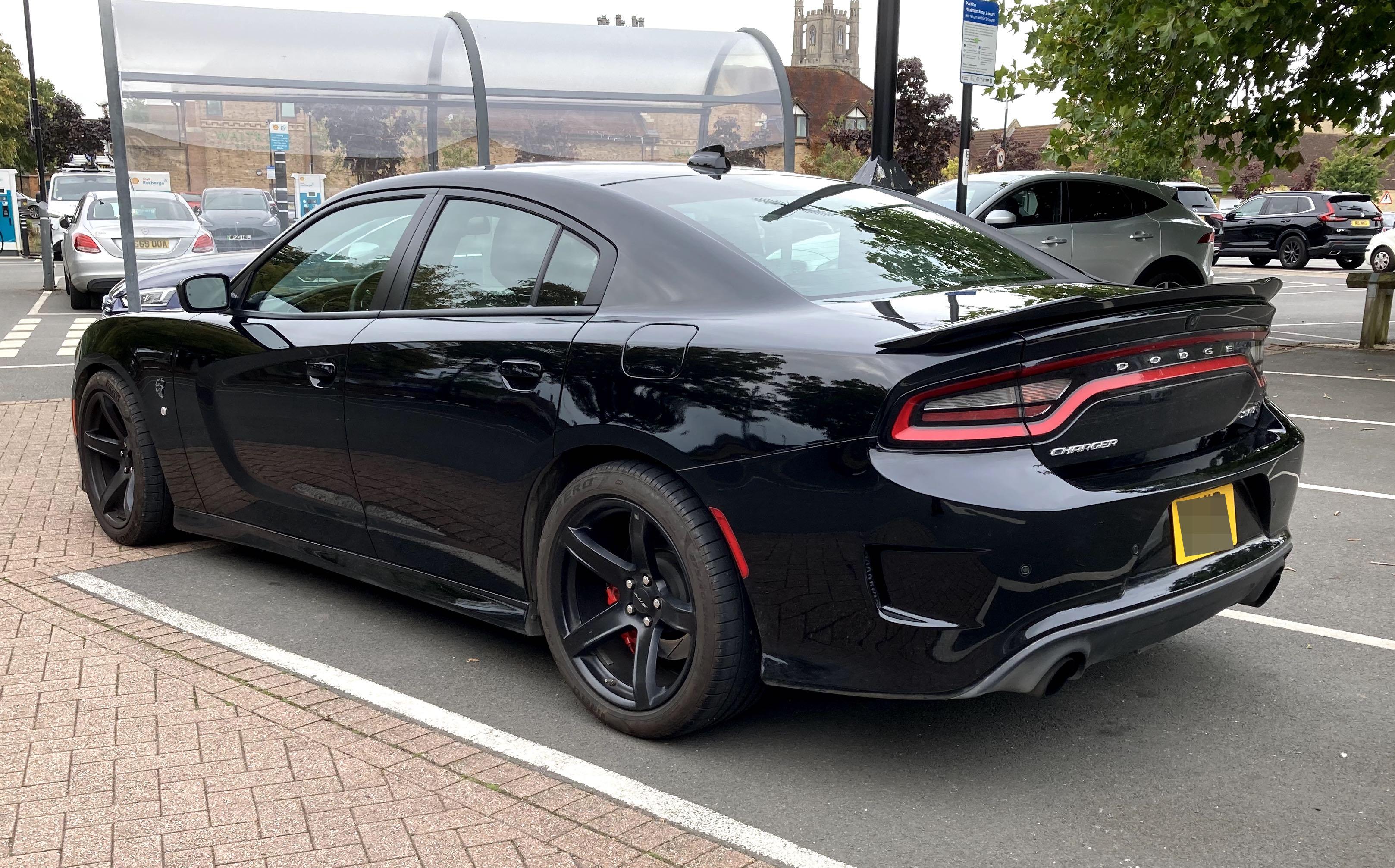 Black Dodge Charger SRT Hellcat, rear quarter view