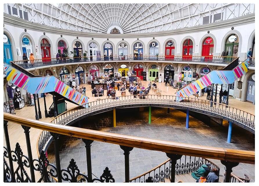 Colour photograph showing the colourful interior of the Leeds Corn Exchange.