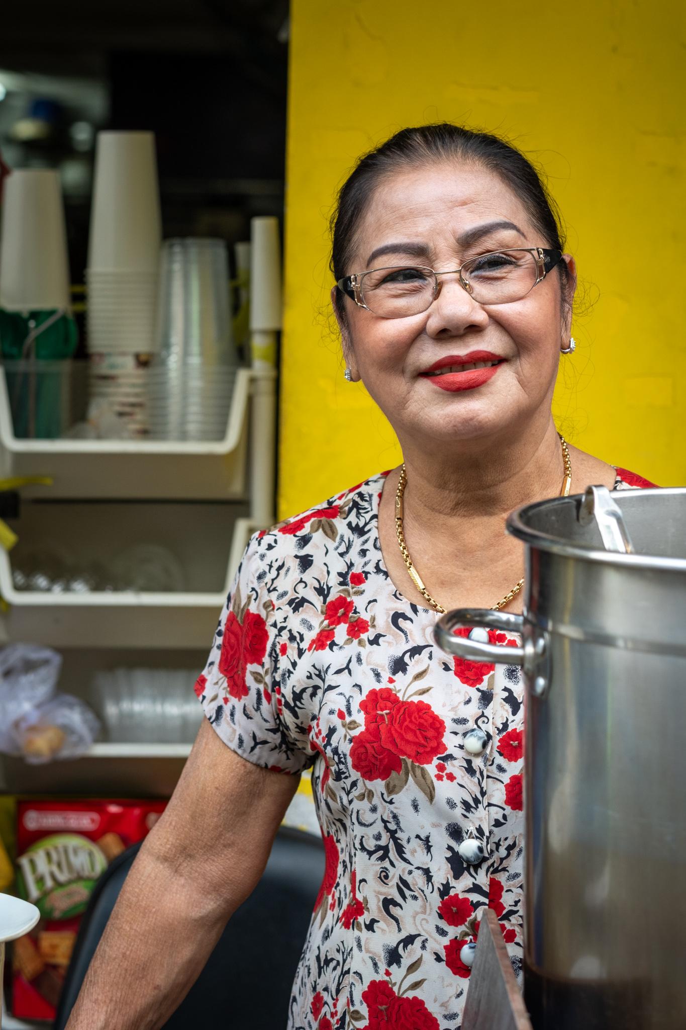This wonderful lady sells soup, I think.