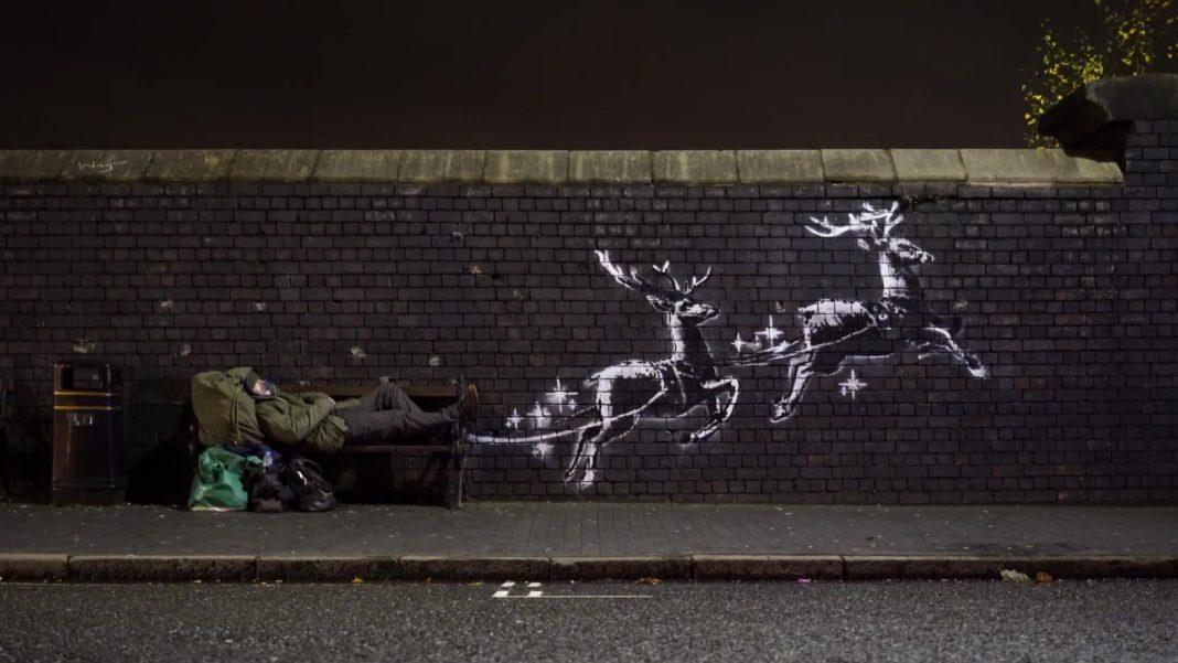 Street art by Banksy in Birmingham, UK